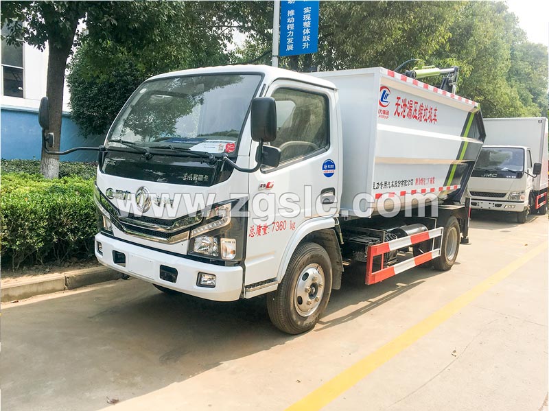 湖北程力集團(tuán)生產(chǎn)的國六無漏泄壓縮垃圾車